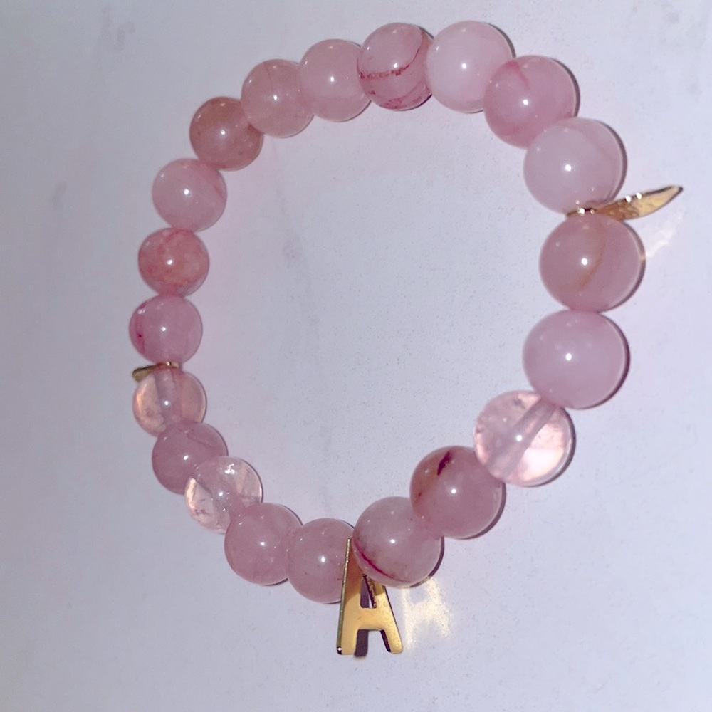 Rose Quartz Stretch Bracelet with Letter ‘A’ and Feather Gold Plated Charms